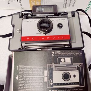Vintage Polaroid Automatic 104 Land Camera Complete with Manual and Strap